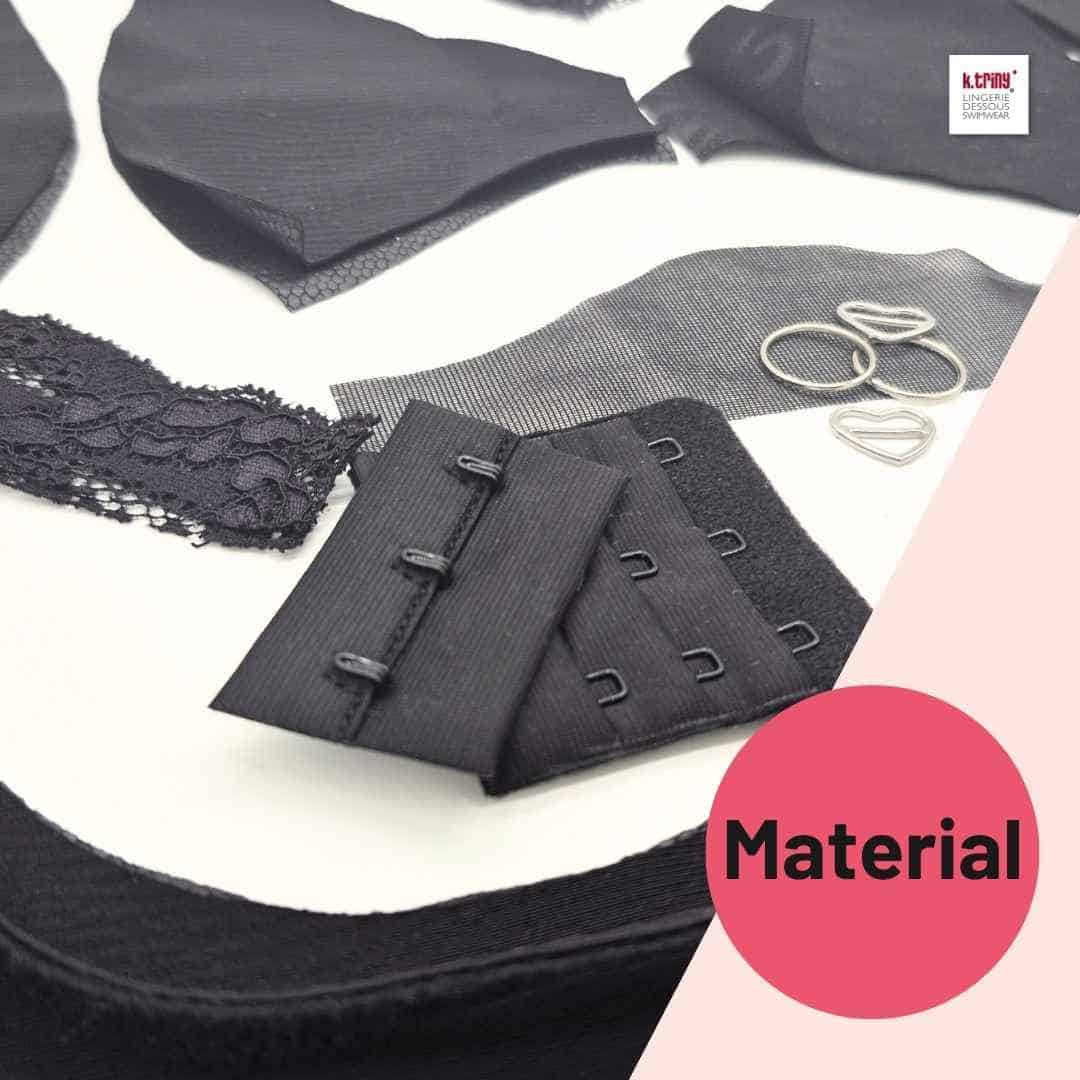 Schwarze BH-Materialien wie Verschluss, Spitzenband, Powernet und Ringe aus dem MaterialkundeMeeting von k.triny* lingerie.